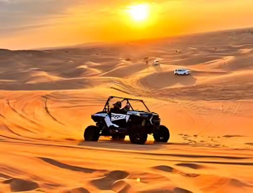 Family enjoying desert quad safari in Dubai