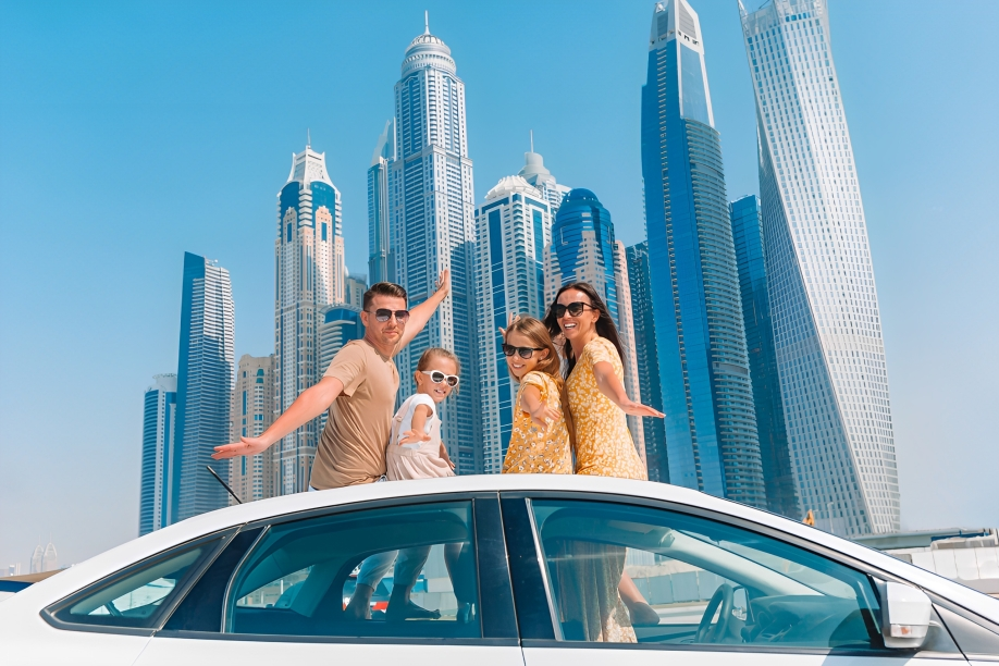 Eco-friendly shared car driving through Dubai streets